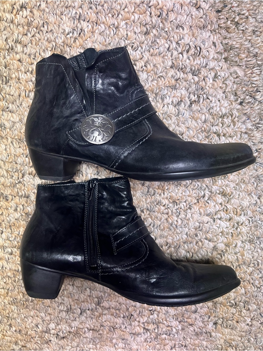Women’s Think! Black Leather Ankle Boots with Decorative Medallion